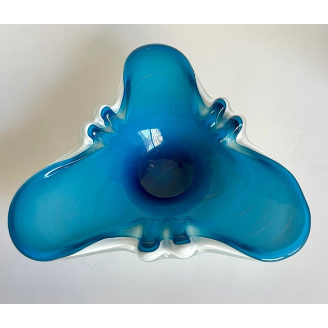 Here is a stunning and unique piece of Murano art glass, made in the mid-century. You can see that the top of the piece is...