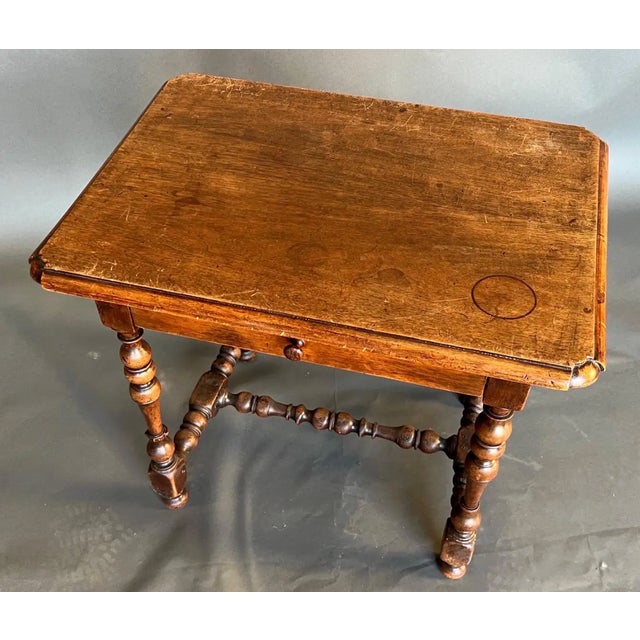 Prettiest little 19th-century French walnut single-drawer side or end table. Great color and patina. Turned legs and...