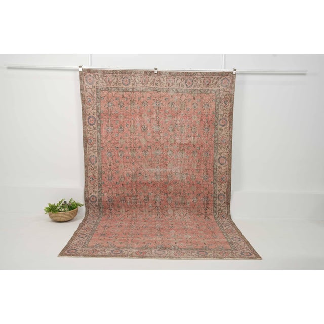 Vintage Hand-Knotted runner rug is a semi-antique vintage area rug. The '70s Eastern region of Anatolia's unique rug is...