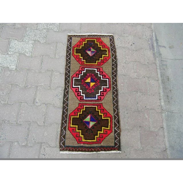 Handknotted vintage rug from kars region of turkey. Approximately 45-55 years old.In very good condition.