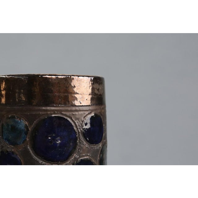 A striking example of post-war Belgian studio pottery, this sculptural ceramic vase was crafted in the 1960s by Perignem,...