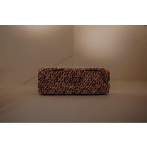 Iconic "Confidential" two-seater sofa, designed by Alberto Rosselli for Saporiti, Italy, 1972. This sofa is considered one...