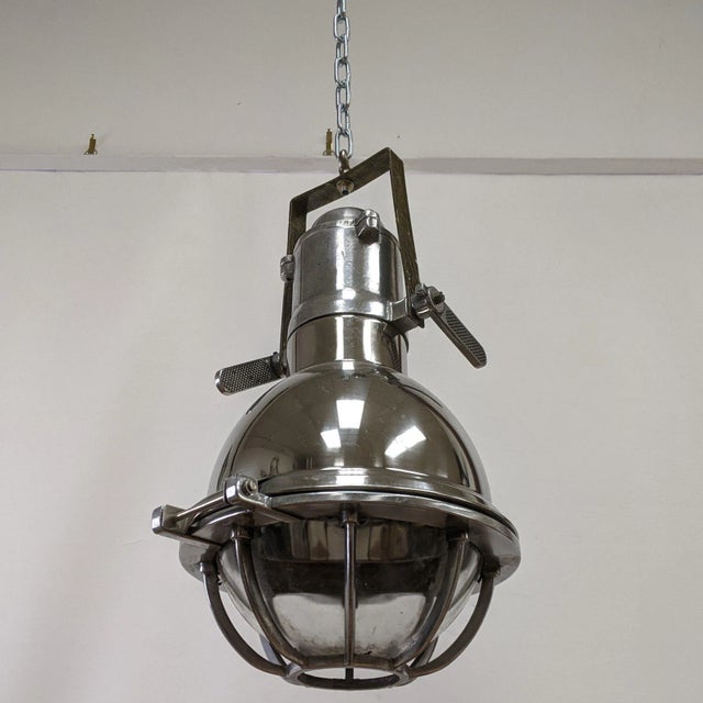 Product Description: Check out this unique Stainless Steel Spotlight Converted to Pendant Light with chain! This light is...