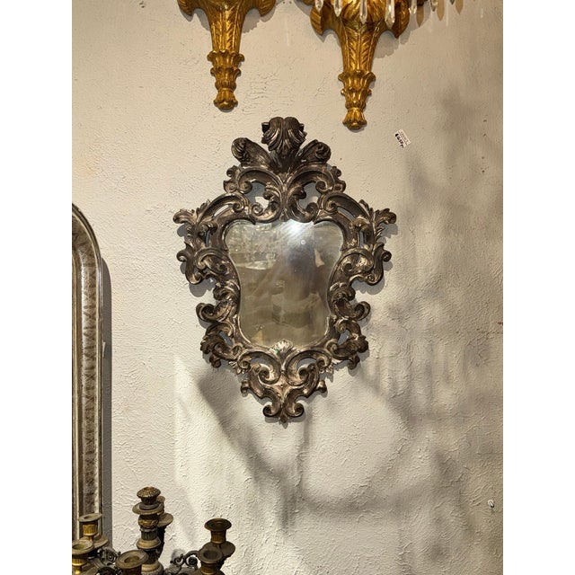 The 19th c. Italian Florentine Silver Leaf Mirror is a stylish and elegant addition to any home decor, Perfect for those...