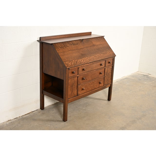 A rare and exceptional antique Mission or Arts & Crafts period quarter sawn oak drop front secretary desk with built-in...
