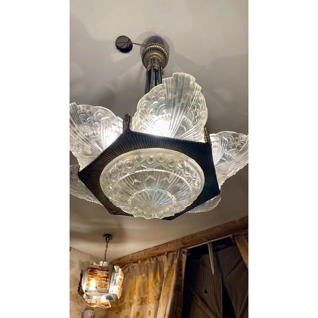 Georges leleu was a prominent french designer renowned for creating art deco chandeliers during the early 20th century,...