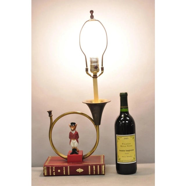 Vintage Equestrian Style Porcelain Snooty Mr. Fox Brass Trumpet on Red Book Figural Table Lamp. Circa Mid 20th Century....