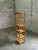 Gorgeous tall shelf with a faux bamboo frame and cane shelves. Great size shelf could work in a variety of spaces. Nice...