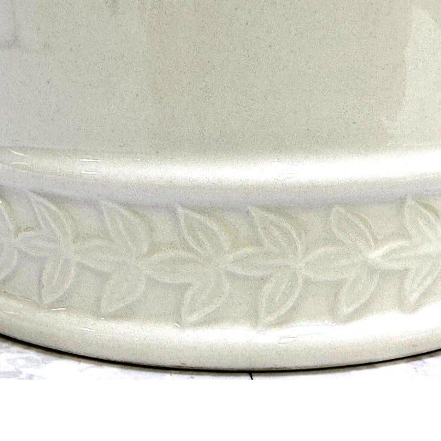Elevate your dining experience with this exquisite Portmeirion design by Susan Williams-Ellis! Additional tankards are...