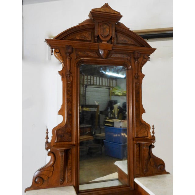 This Victorian gentleman's dresser is a beauty. Done in walnut and burled walnut it has a warm glow to it. Intricate...