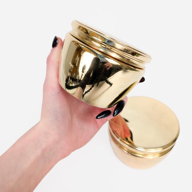 A fine pair of signed gilt silver boxes. By Tiffany & Co. In sterling silver with a gilt finish. Pattern no. 21618. Marked...