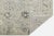 Elevate your living space with this sophisticated Modern Oushak style rug, hand-knotted from highland wool for durability...