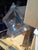 This silver plate and polished aluminum wall light can also be hung as a corner lamp and ceiling lamp it's 27" by 27 and...