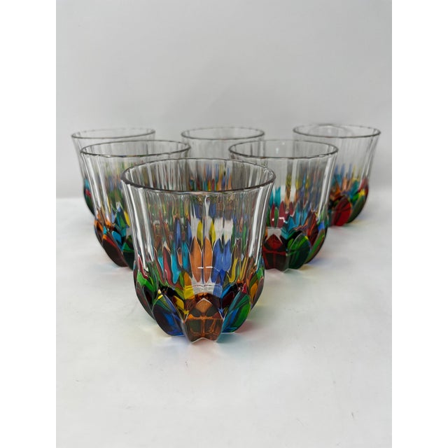 This lovely set of 6 whiskey/water glasses features incredible colors and would be a wonderful addition to any room....