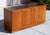 This Mid-Century Modern credenza sideboard, dating to the circa 1970s, is a refined example of American modern furniture...