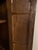 An exceptional 19th-century Chinese Qing Dynasty period tapered wedding cabinet crafted from beautifully grained solid...