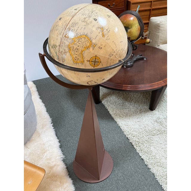 Design Plus Gallery presents a Signed Replogle World Floor Globe with Cast Metal Stand by Tom Torrens. This floor globe is...