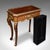 This is an antique jardiniere table. A French, walnut and giltwood planter stand or decanter caddy, dating to the Regency...