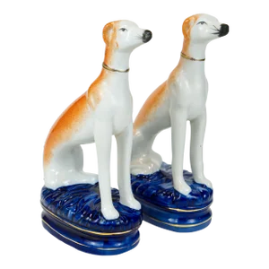 Staffordshire Porcelain Sitting Greyhound Dogs - a Pair