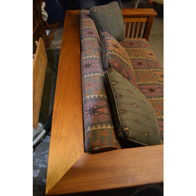 This loveseat is in great condition. Solid & well made. Not sure on the wood type, possibly teak, as heavy. Upholstery is...