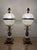 Elegant pair of vintage table lamps featuring brilliant cut crystal-style globe shades, ornate gilt metal bases, faceted...