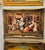 Beautiful wall art print on premium cotton fabric featuring an elegant Victorian-style social gathering in a refined...