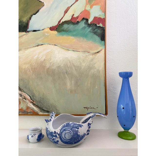 This tureen/serving bowl is sure to delight your guest with it’s classic Bjorn Wiinblad whimsy. The ladle sits on the back...