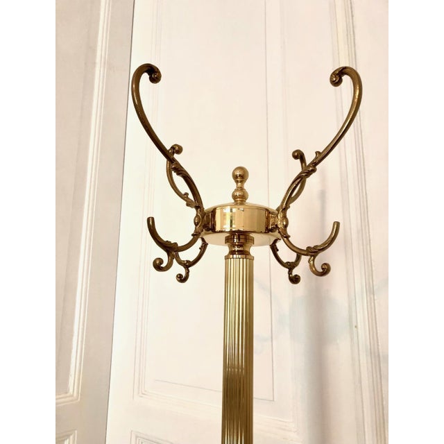 A stunning and breathtaking Italian brass coat rack from the iconic 1920s and 30s (Art Deco). The coat rack is made of...