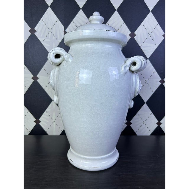Large Italian ceramic lidded urn by Torcivia e Todaro for Fortunata. The urn features a tapered classical form with a...