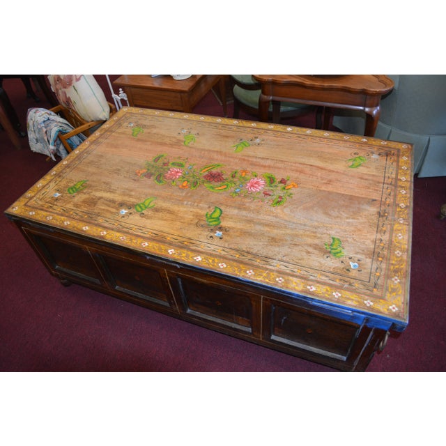 This is an awesome trunk! Very heavy wood with iron ring accents. Possibly Indian/Indonesian. Hinged top. Sadly when we...