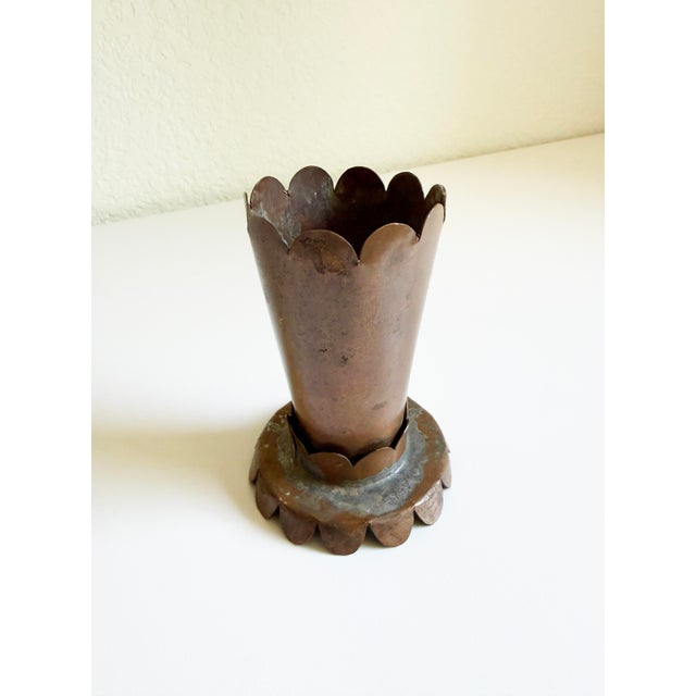 Unique copper bud vase with scalloped detailing and a lovely patina. Vintage circa 1940s, France.