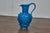 This striking French Vallauris pottery pitcher, crafted around the 1950s, showcases the bold creativity that defined mid-...