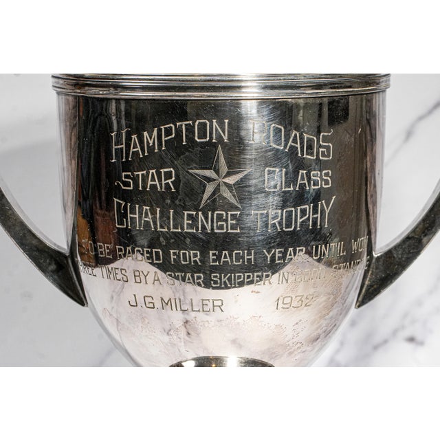 A remarkable piece of American nautical history, this impressive silverplate trophy is both a collector’s item and a...