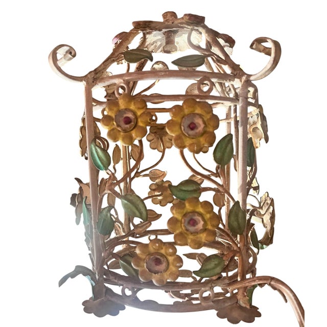 Beautiful Hollywood Regency Rod iron forearmed chandelier a dome shape top with blooms leaves and vines throughout. True...
