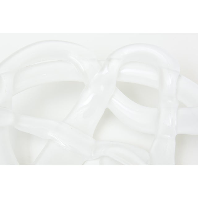 This lovely Swedish vintage white cased twisted swirled glass bowl is by Kosta Boda. Hallmarked on the bottom Kosta Boda...
