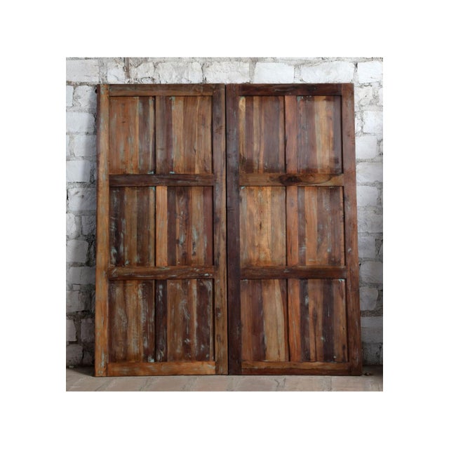 Infuse your home with soulful character through this vintage carved wood door, finished in a beautifully weathered rustic...