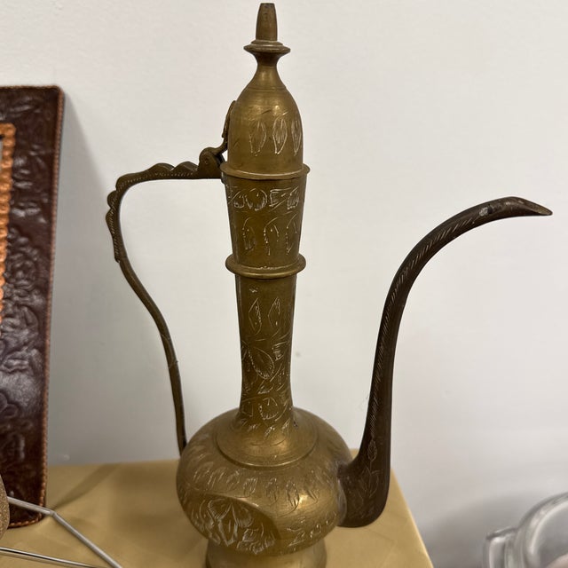 Vintage:antique brass coffee urn.. not sure of its intended use. Item has been in storage for 25 years No dents or scratches.