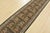 An authentic vintage traditional Sarouk runner hand-knotted with fine wool and natural dyes. This intricately woven rug...