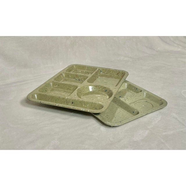Vintage set of 2 Texas Dallas Ware plate trays in an olive green confetti pattern with six divided compartments. Made of...