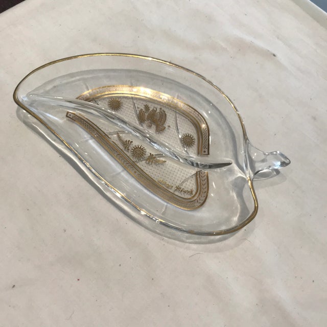 Gilded, leaf shaped, clear glass, divided dish with detailed decorations of birds and suns. Perfect server for snacks or...