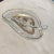 Gilded, leaf shaped, clear glass, divided dish with detailed decorations of birds and suns. Perfect server for snacks or...