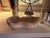 Rustic vintage hand-carved wood dough bowl featuring an elongated organic form and distinctive scalloped, hand-notched...