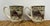 A set of two coffee mugs in traditional transferware- They each feature alike the "Covered Bridge" scene in the Friendly...