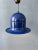 Unique mid century space age pendant light in blue colour. The lamp is made out of metal and has a glossy yellow lacquer....