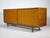High-quality sliding-door sideboard made of teak. Model: Cambor Design: Ernst Martin Dettinger Manufacturer: Bormann We...