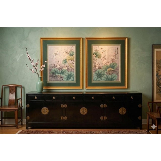 Stunning vintage prints of lotus blooms, leaves and cranes, featuring Japanese lettering down one side of one of the...