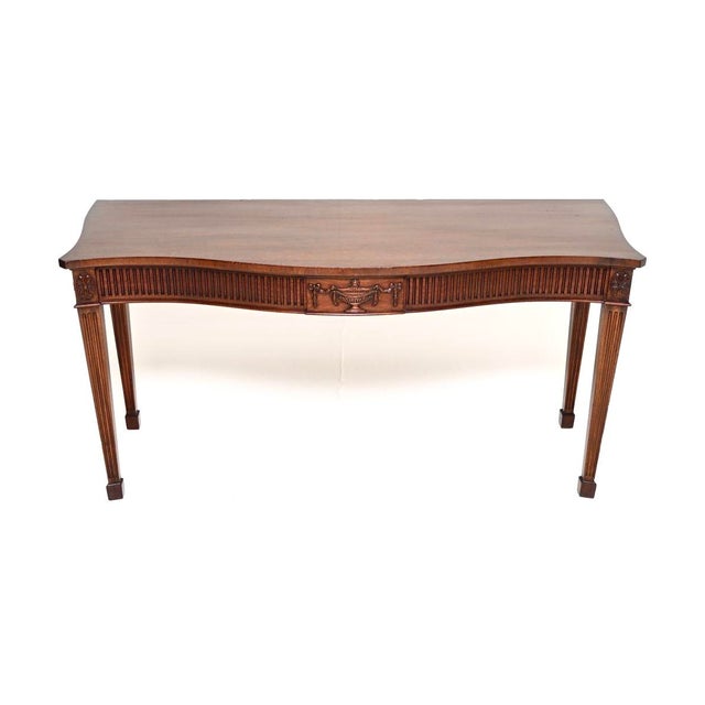 A smart and extremely well made antique Sheraton style console table by William Tillman. This was made in England, it...