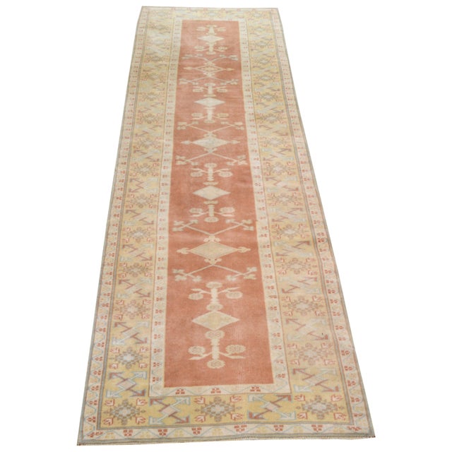 Hand-knotted with care using traditional rug-making techniques, this wool rug blends timeless craftsmanship with a modern...