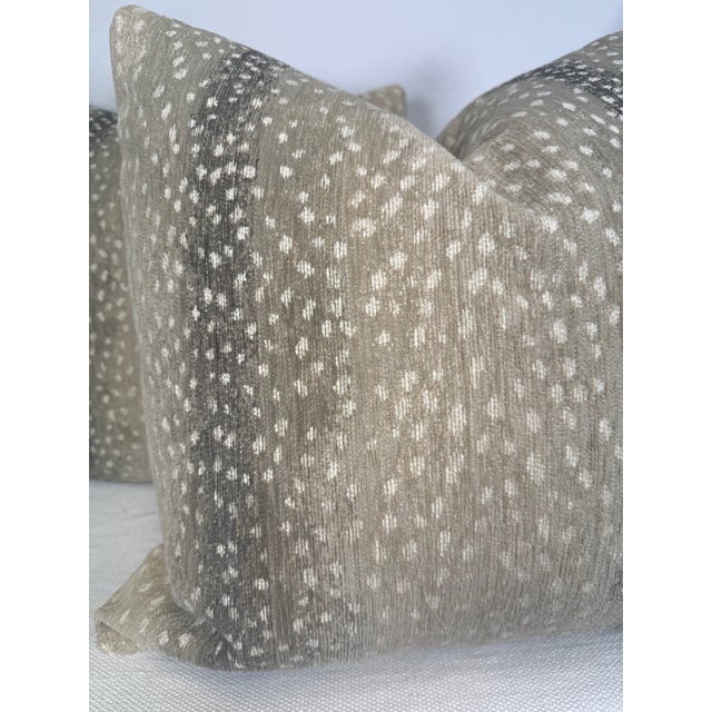 Custom pair of 22" pillows covered in an antelope patterned chenille in a natural colorway. These pillows have tapered...