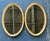This exquisite pair of vintage Hollywood Regency oval mirrors is a masterful example of Neoclassical-inspired design. Each...
